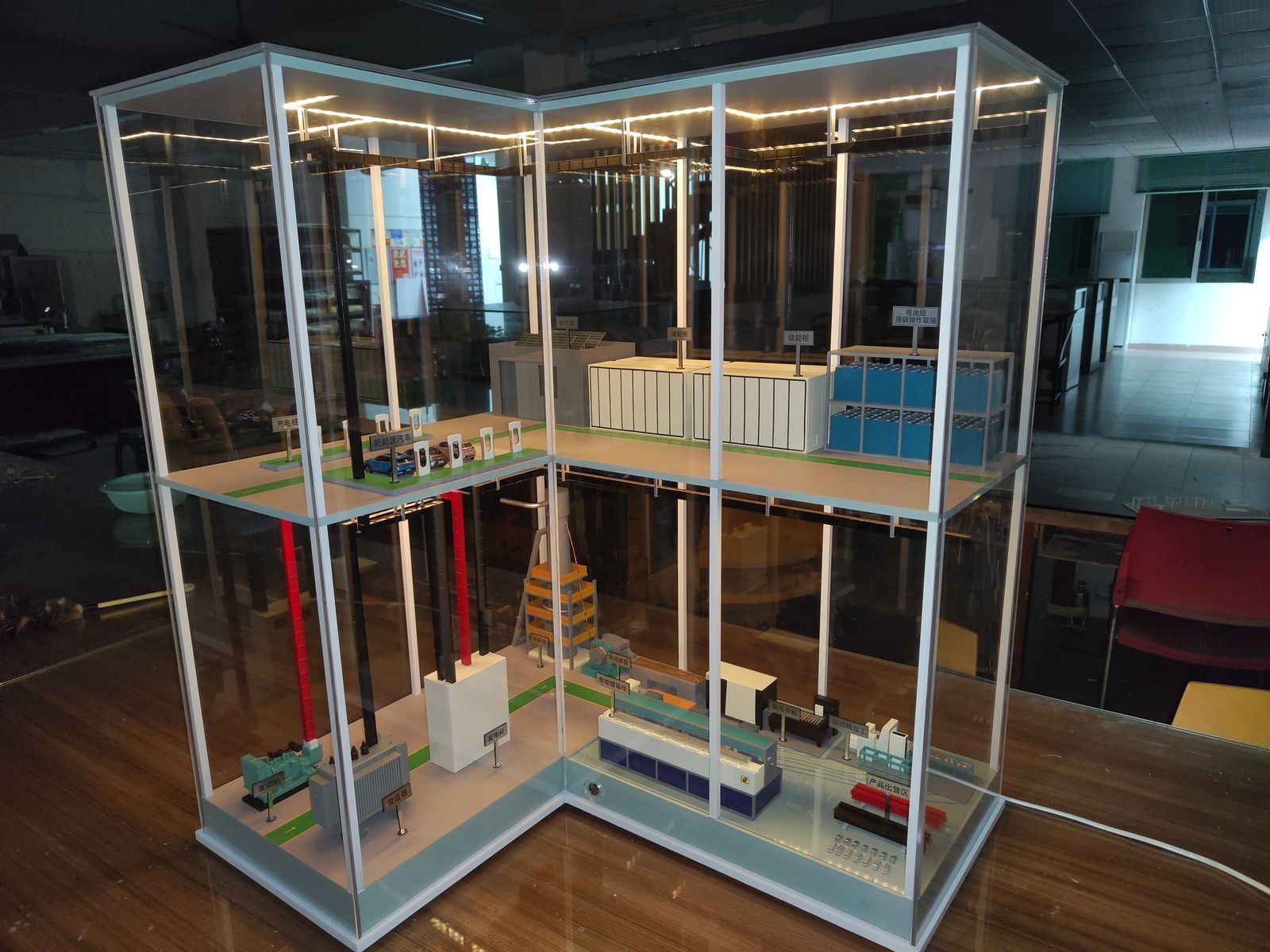 Production-line model enclosed in an acrylic display case