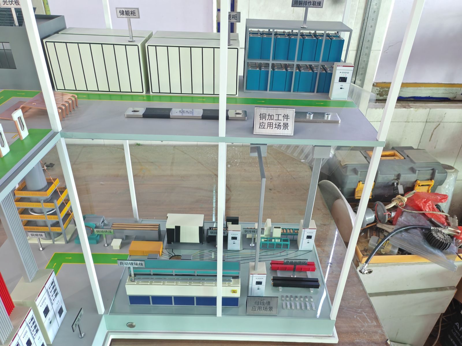 Factory workshop model showing logistics bays and storage racks